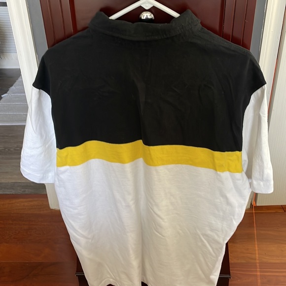Banana Republic Polo never worn.  Black white and yellow.  Excellent!!  Size XLT - Picture 2 of 3